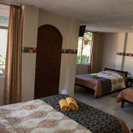 Hotel Flor De Oriente Baños Esterno foto