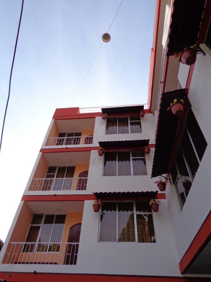 Hotel Flor De Oriente Baños Esterno foto